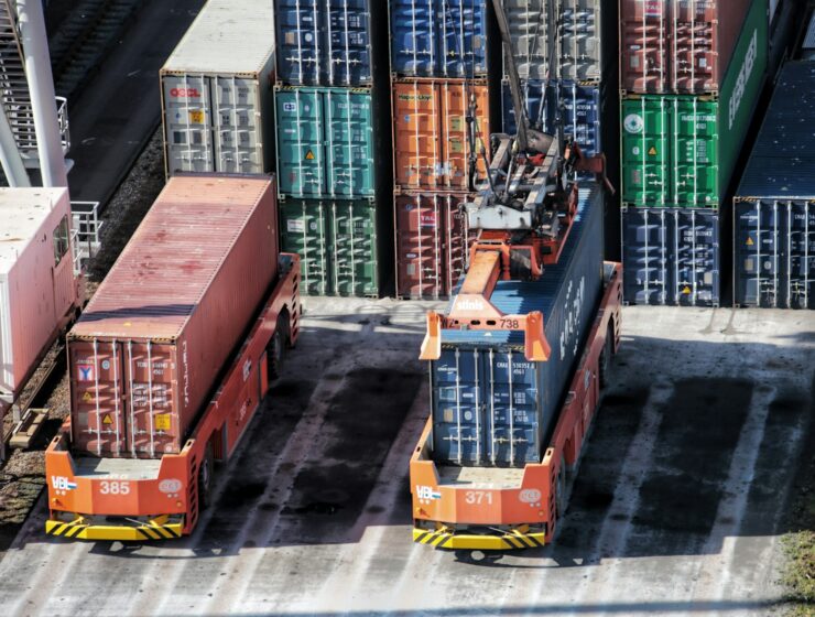 cargo containers are stacked on top of each other