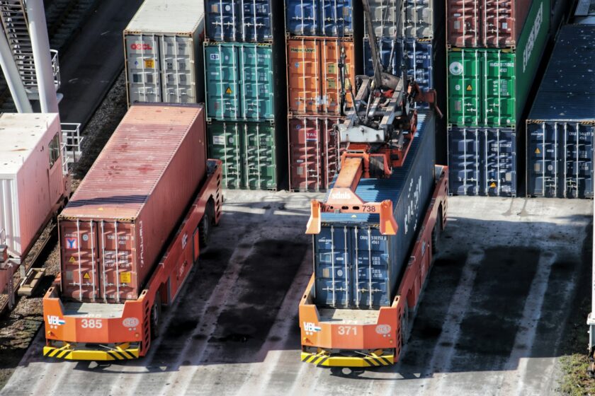 cargo containers are stacked on top of each other